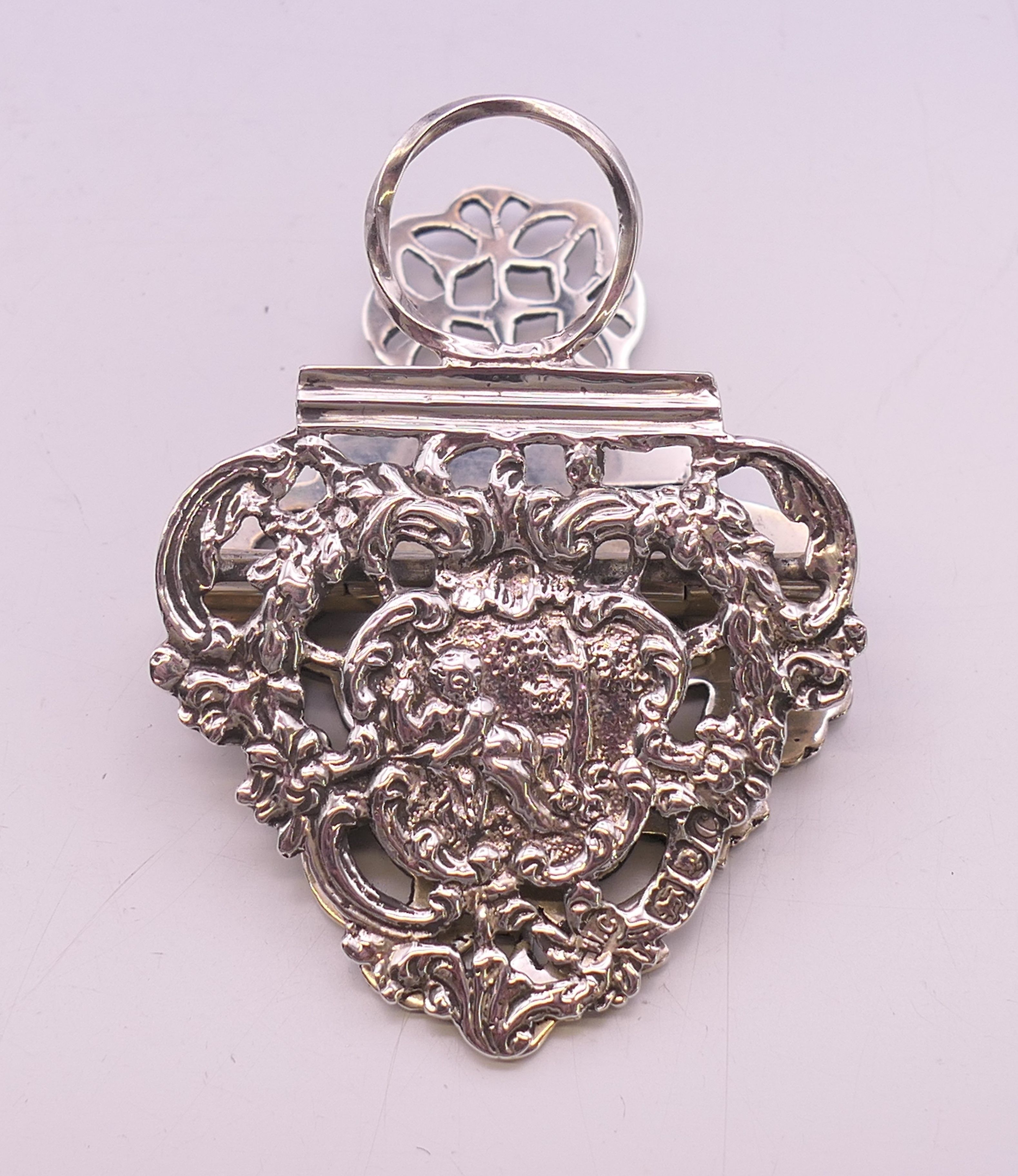 A pierced silver letter clip. 42 grammes. 6.5 cm high. - Image 4 of 5