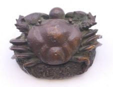 A bronze crab with a pearl. 4 cm high.