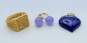 A pair of 14 K gold and lavender jade earrings,