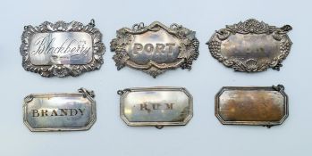 Two silver (Blackberry and Port) and four silver plated decanter labels (Port, Brandy, Rum and Gin).