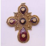 An antique gold garnet and seed pearl cross pendant, the later back tested as 18 ct gold. 5 cm x 4.