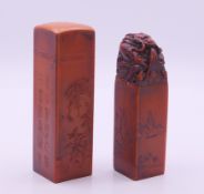 Two Chinese soapstone seals. Larger 12 cm high.