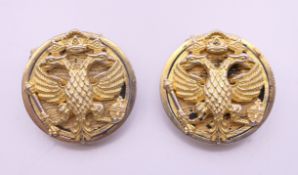 A pair of silver eagle cufflinks bearing Russian marks. 2.5 cm diameter.