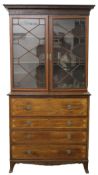 A 19th century mahogany secretaire with associated bookcase top. 125 cm wide x 226 cm high.