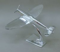 A Spitfire ornament. 35 cm wide.