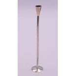 A silver taper stick. 10 grammes. 14.5 cm high.