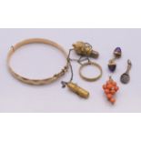 A quantity of various jewellery, to include: a 1/5th 9 ct gold bangle, a coral grapevine brooch,