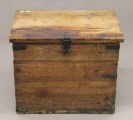 A 19th century iron-bound pine trunk. 65 cm wide x 54 cm high.