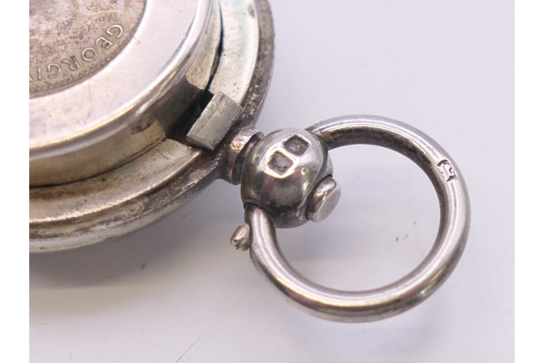 A silver sovereign holder. 4.5 cm high including suspension loop. - Image 5 of 6