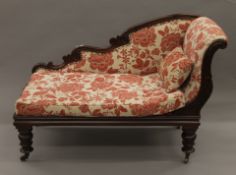 A 19th century mahogany upholstered chaise lounge. 125 cm long.