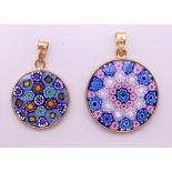 Two silver gilt Venetian millefiori glass pendants. 2.5 and 2 cm diameter respectively.