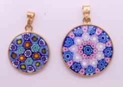 Two silver gilt Venetian millefiori glass pendants. 2.5 and 2 cm diameter respectively.