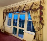 A pair of floral lined pencil-pleat curtains and a curtain rail,