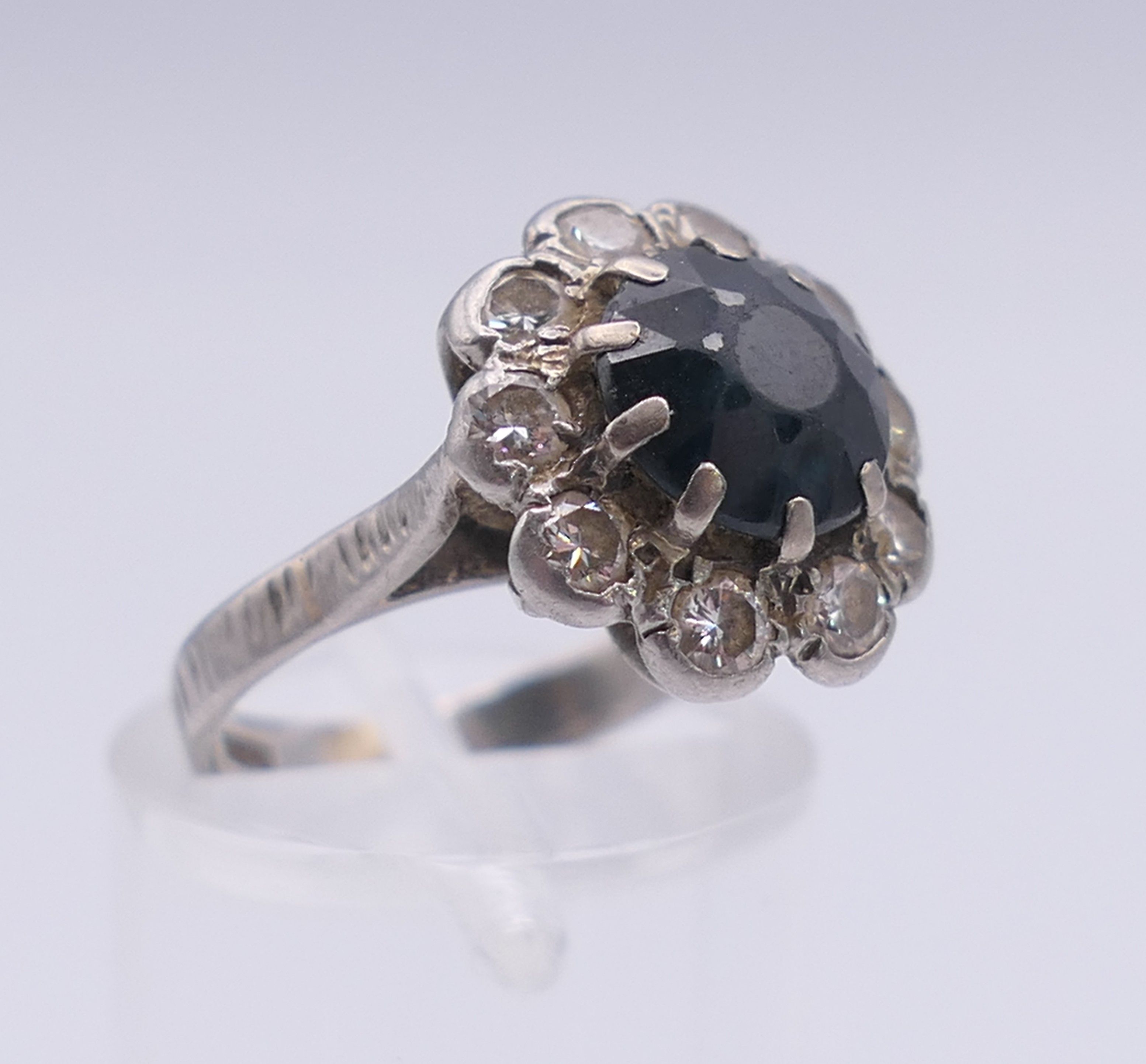 A platinum diamond and sapphire ring. Ring size H. - Image 5 of 8