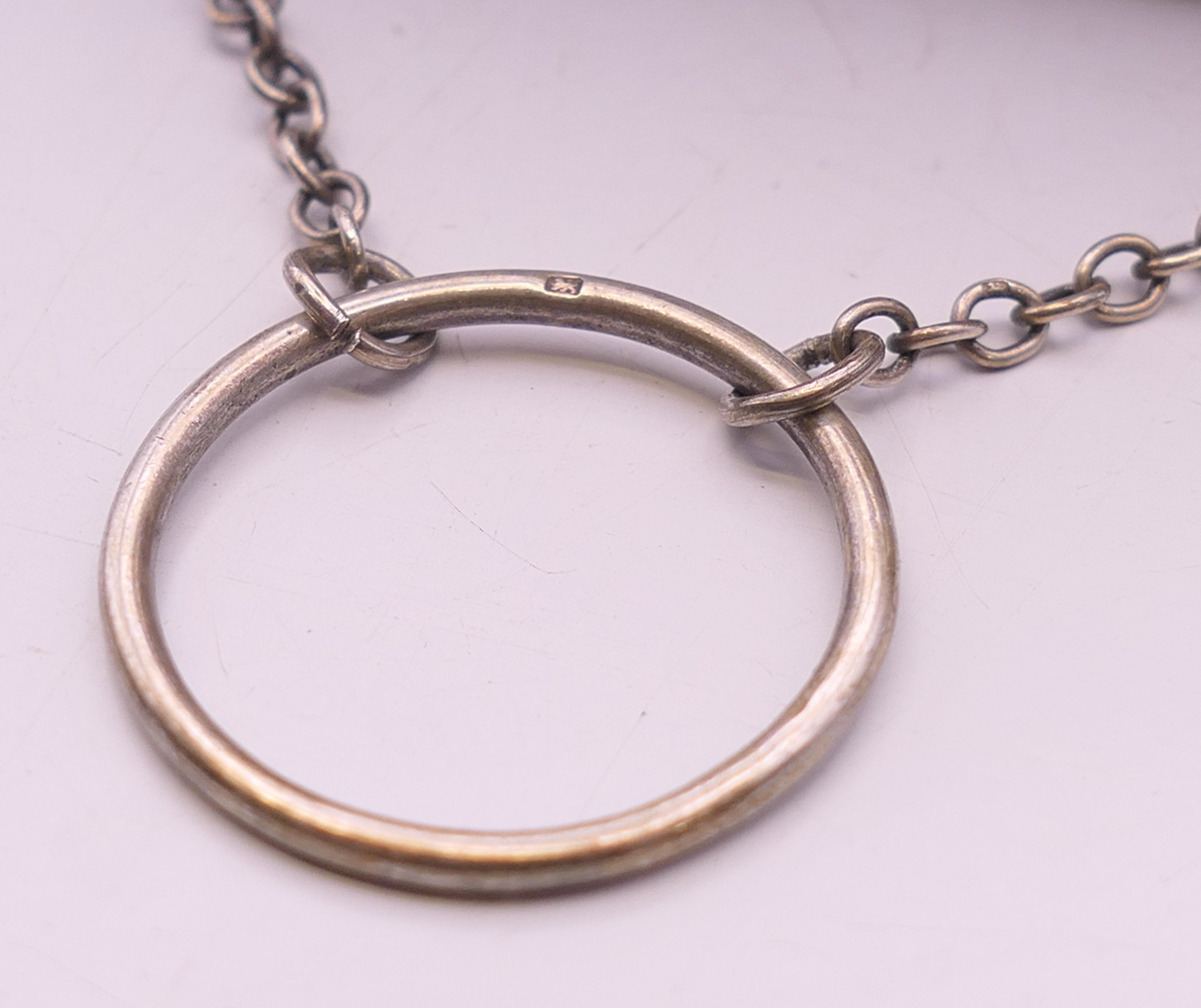 A silver purse. 8 cm x 10 cm. 72 grammes total weight. - Image 3 of 6