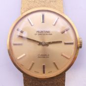 A Montine 17 jewels Incabloc Swiss made gilt gentleman's wristwatch. 3.25 cm diameter.