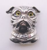 A silver bulldog brooch/pendant. 2.5 cm high.