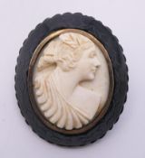 A Victorian Whitby jet cameo brooch. 5.5 cm high.