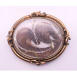 A Victorian mourning brooch/pendant. 5 cm high.