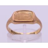 An 18 ct gold ring. Ring size N. 4.1 grammes.