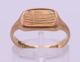 An 18 ct gold ring. Ring size N. 4.1 grammes.