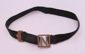 A 9 ct gold letter N (4.2 cm high) and seed pearl bracelet.