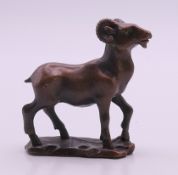 A bronze model of a ram. 6 cm high.