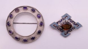 A 19th century Scottish circular silver cloak pin set with twelve faceted amethysts,