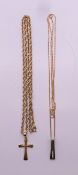 Two 9 ct gold pendant necklaces - one diamond set, the other a cross. The diamond pendant 2 cm high.