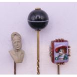 Three various stick pins - one mounted with banded agate, one with the bust of Dante,