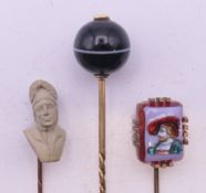 Three various stick pins - one mounted with banded agate, one with the bust of Dante,