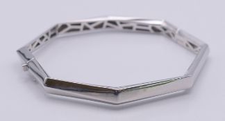 A silver octagonal bracelet. 6.25 cm inner diameter.