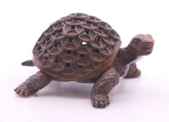A bronze box formed as a tortoise. 9 cm long.