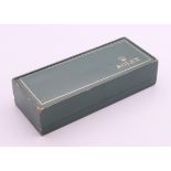 A vacant 1970's Rolex watch box. 15 cm long.