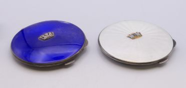 Two silver and enamel compacts, each decorated with Naval crowns. Each 7.5 cm diameter.
