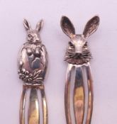 Two silver rabbit form bookmarks. The largest 6 cm high.