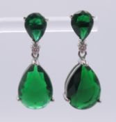 A pair of stone-set earrings. 3 cm high.