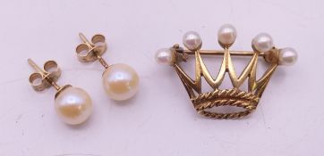 A 14 ct gold lapel pin in the form of a coronet with pearl terminals, 2.