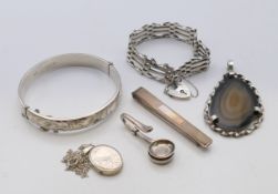 A quantity of various silver jewellery, to include a gate bracelet, a locket and chain, a bangle,