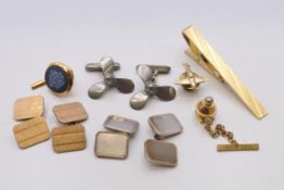 A quantity of various cufflinks, clips and pins, to include a boxed Wedgwood ship pin,