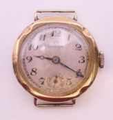 A 9 ct gold Omega ladies' wristwatch, 2.7 cm wide. 14.8 grammes total weight.