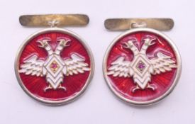 A pair of silver eagle cufflinks bearing Russian marks. 2 cm diameter.
