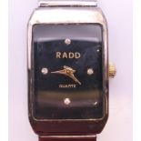 A Rado diamond-set quartz ladies' wristwatch. Dial 2 x 1.5 cm.