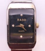 A Rado diamond-set quartz ladies' wristwatch. Dial 2 x 1.5 cm.