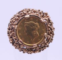 A 9 ct gold 1853 1 dollar coin set ring. Ring size J/K. 9 grammes total weight.