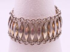 A silver bracelet. 18.5 cm long.