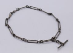 A silver watch chain. 37 cm long.