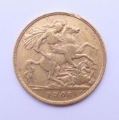 A 1908 gold half sovereign.