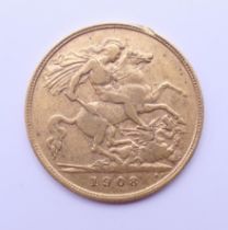 A 1908 gold half sovereign.
