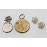 A pair of silver filigree earrings,